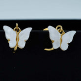 white butterfly drops