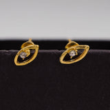 evil eye almond studs