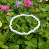 white beaded band