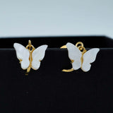 white butterfly drops