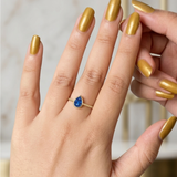 The Azure Drop: Pear-Cut Sapphire Twisted Band Ring in 18K Gold