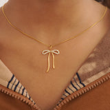 Faina big bow charm