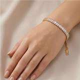 Elegance in Bloom: Gold-Tone Baguette Crystal Tennis Bracelet