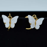 white butterfly drops