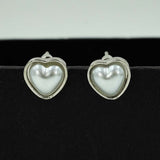 heart shaped silver studs