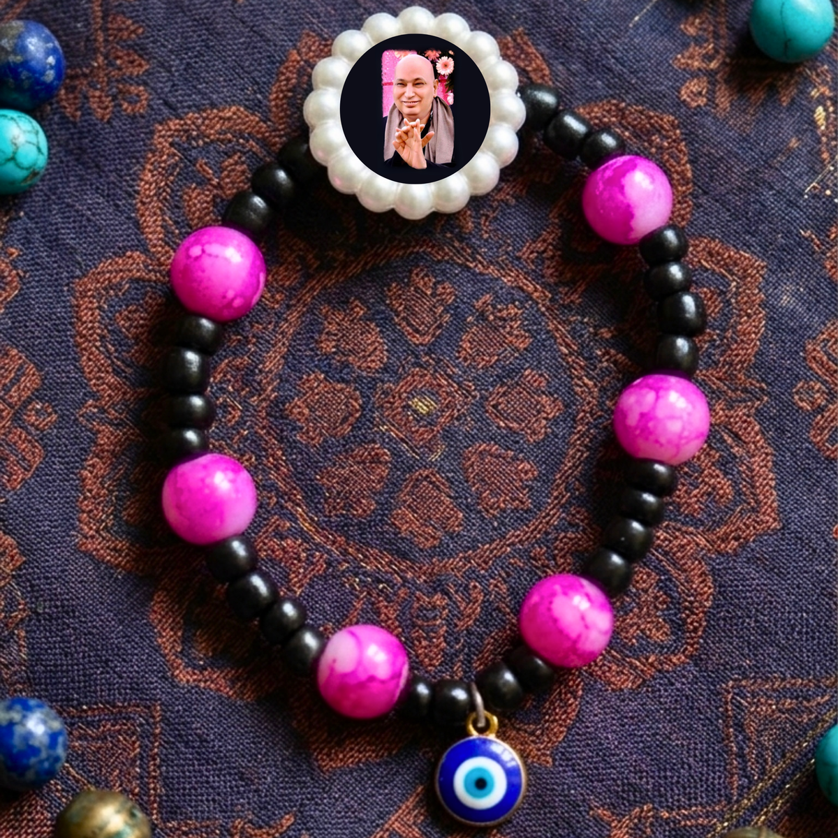 Nazar Suraksha Spiritual Pearl Rakhi – Evil Eye & Vibrant Magenta Devotional Bracelet