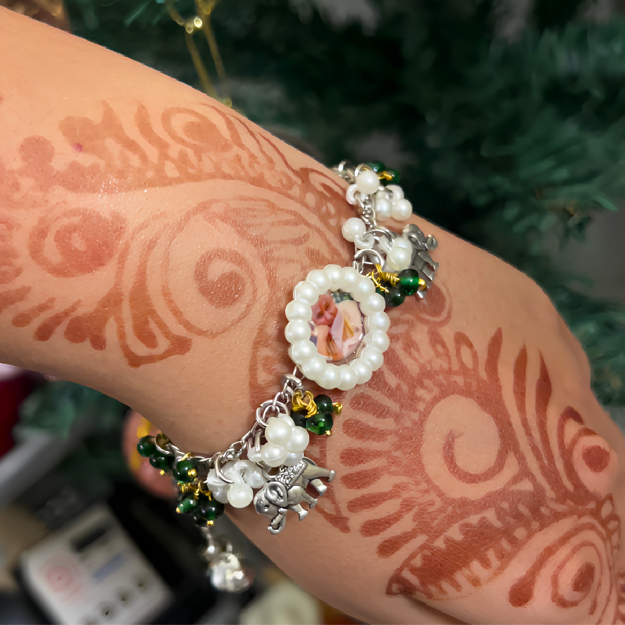 Ethereal Grace: Handcrafted Silver-Finish Divine Charm Bracelet
