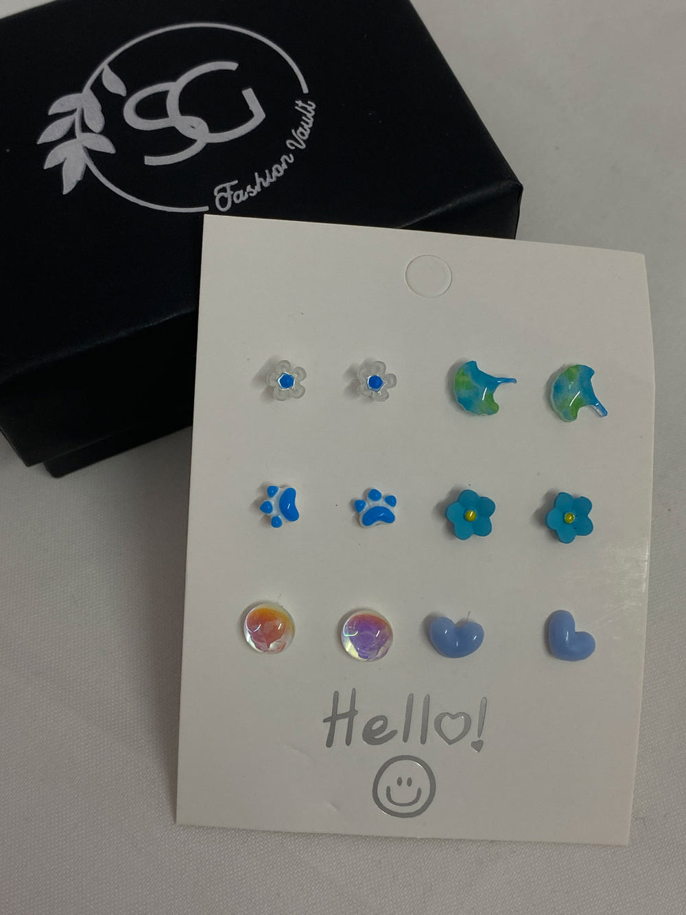 Blue toned silver needle studs