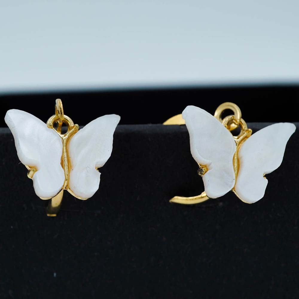 white butterfly drops