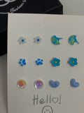 Blue toned silver needle studs