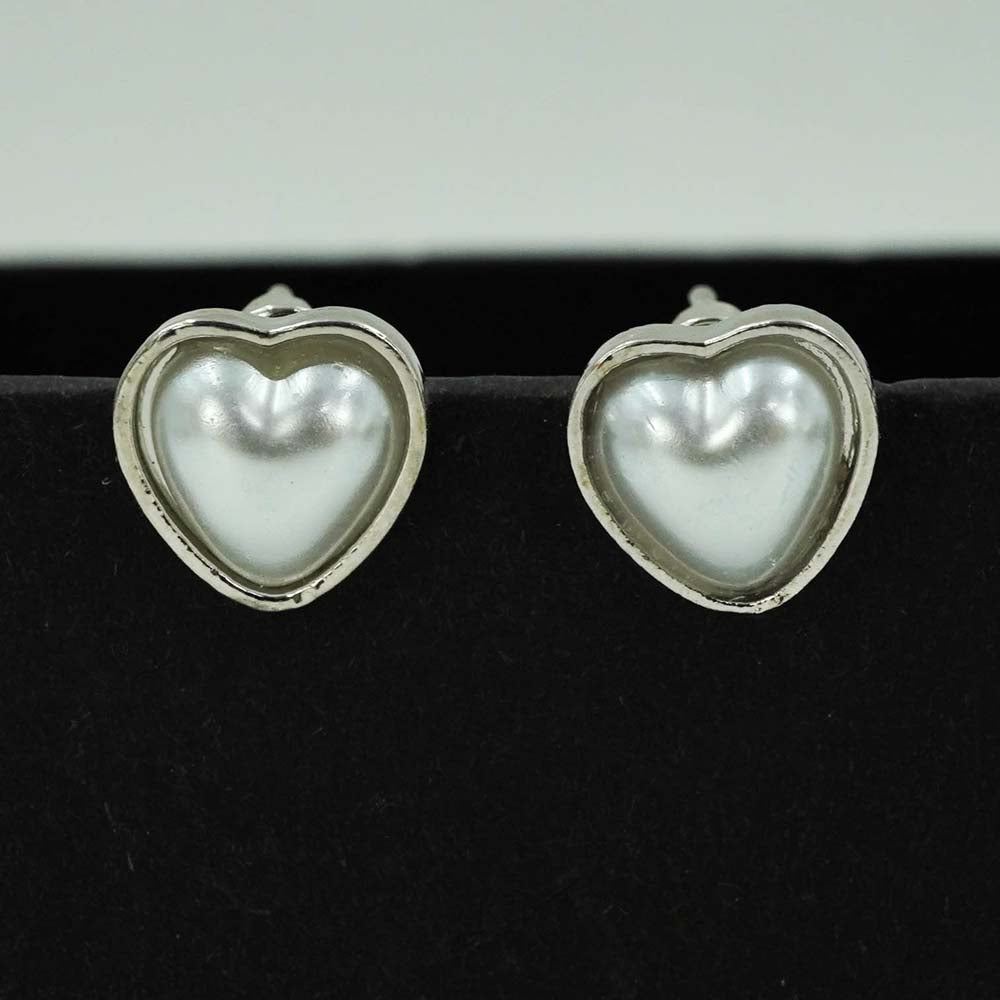 heart shaped silver studs
