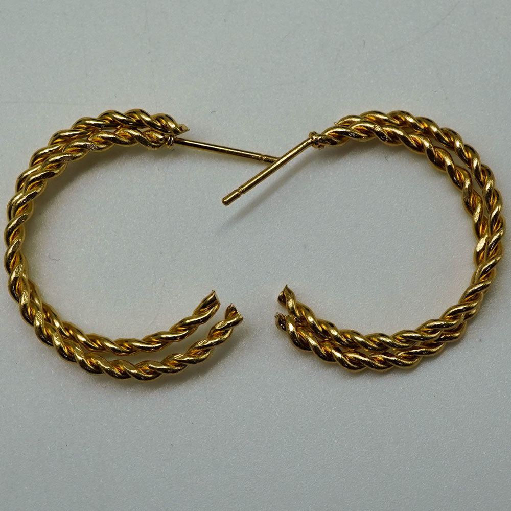 twisted golden hoops