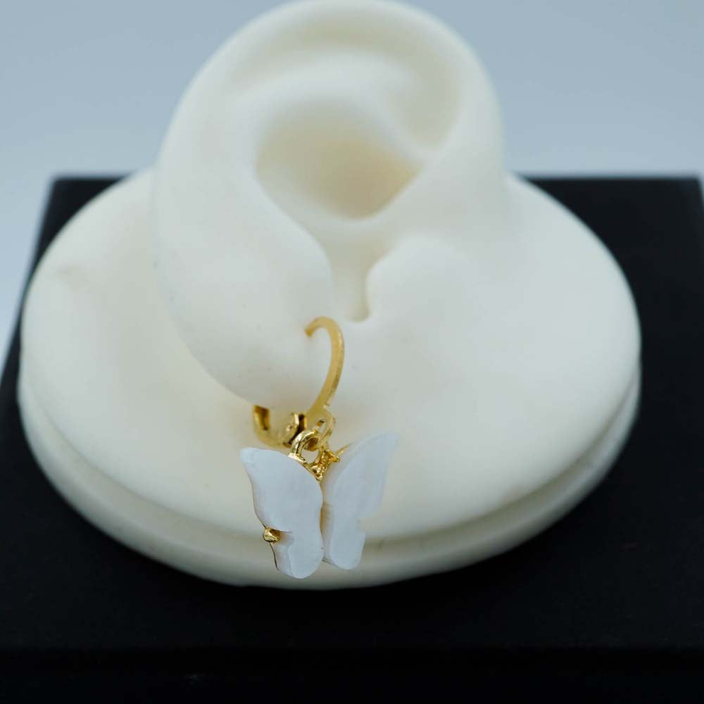white butterfly drops