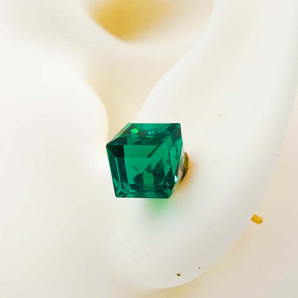 green cubic studs