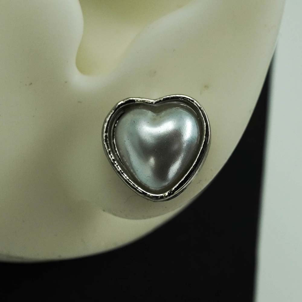 heart shaped silver studs