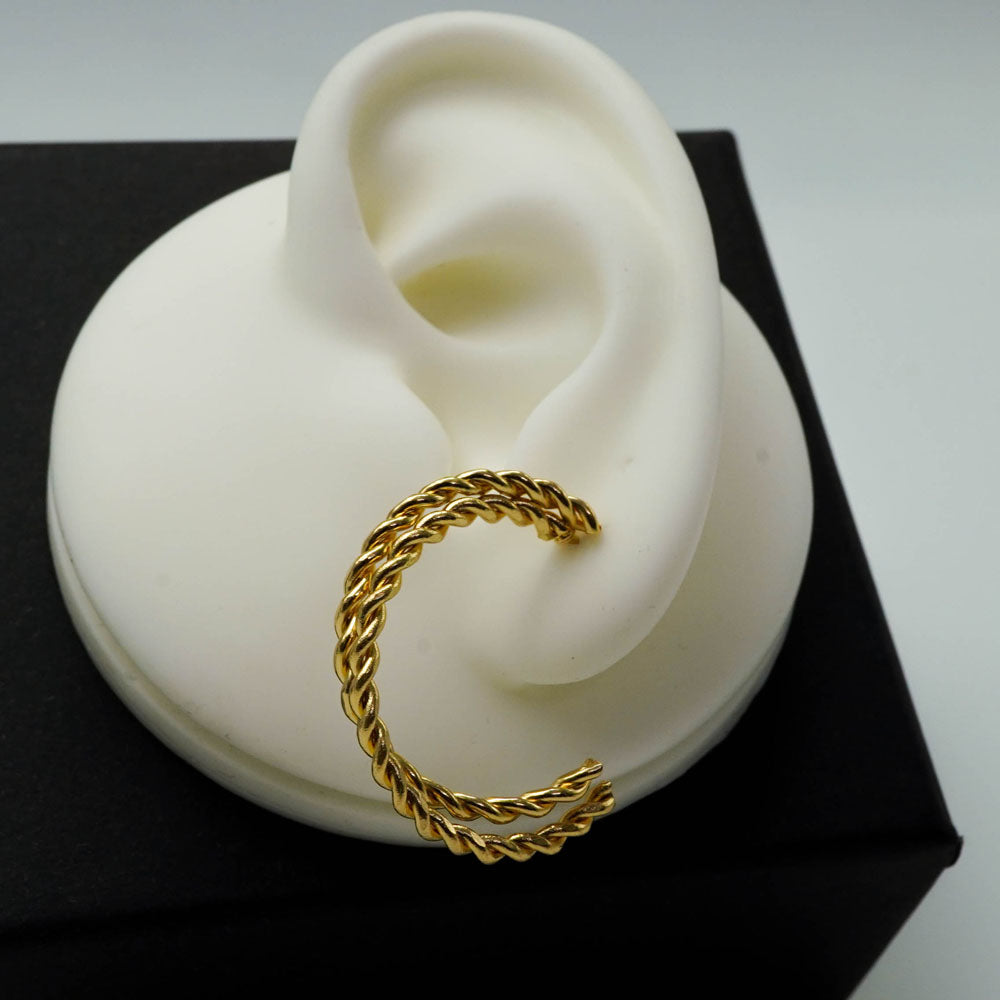 twisted golden hoops