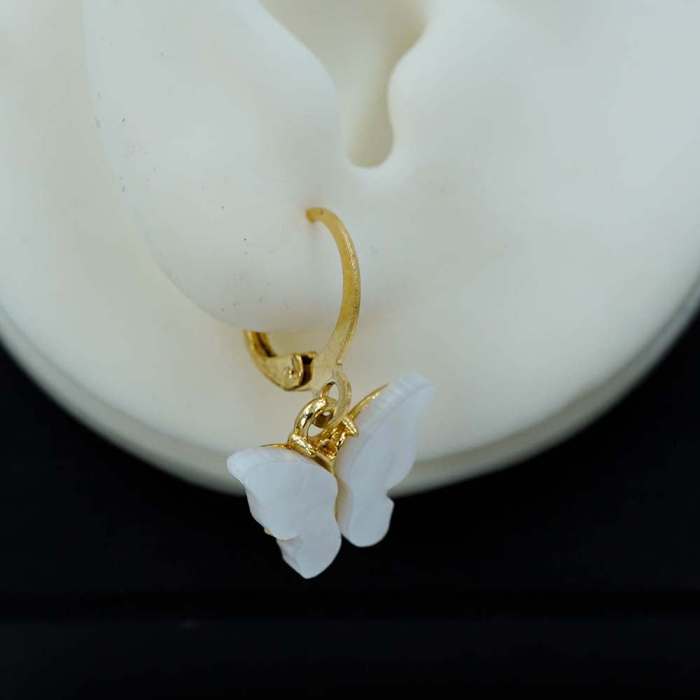 white butterfly drops
