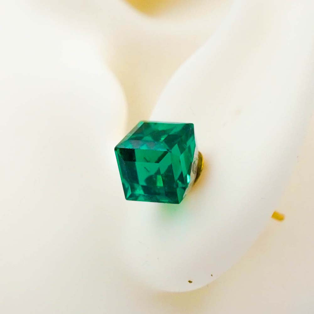 green cubic studs