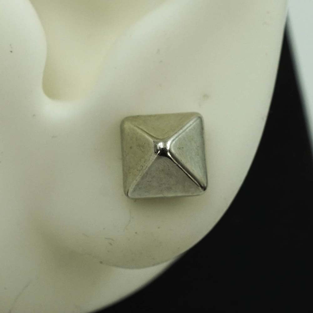 pyramid silver studs