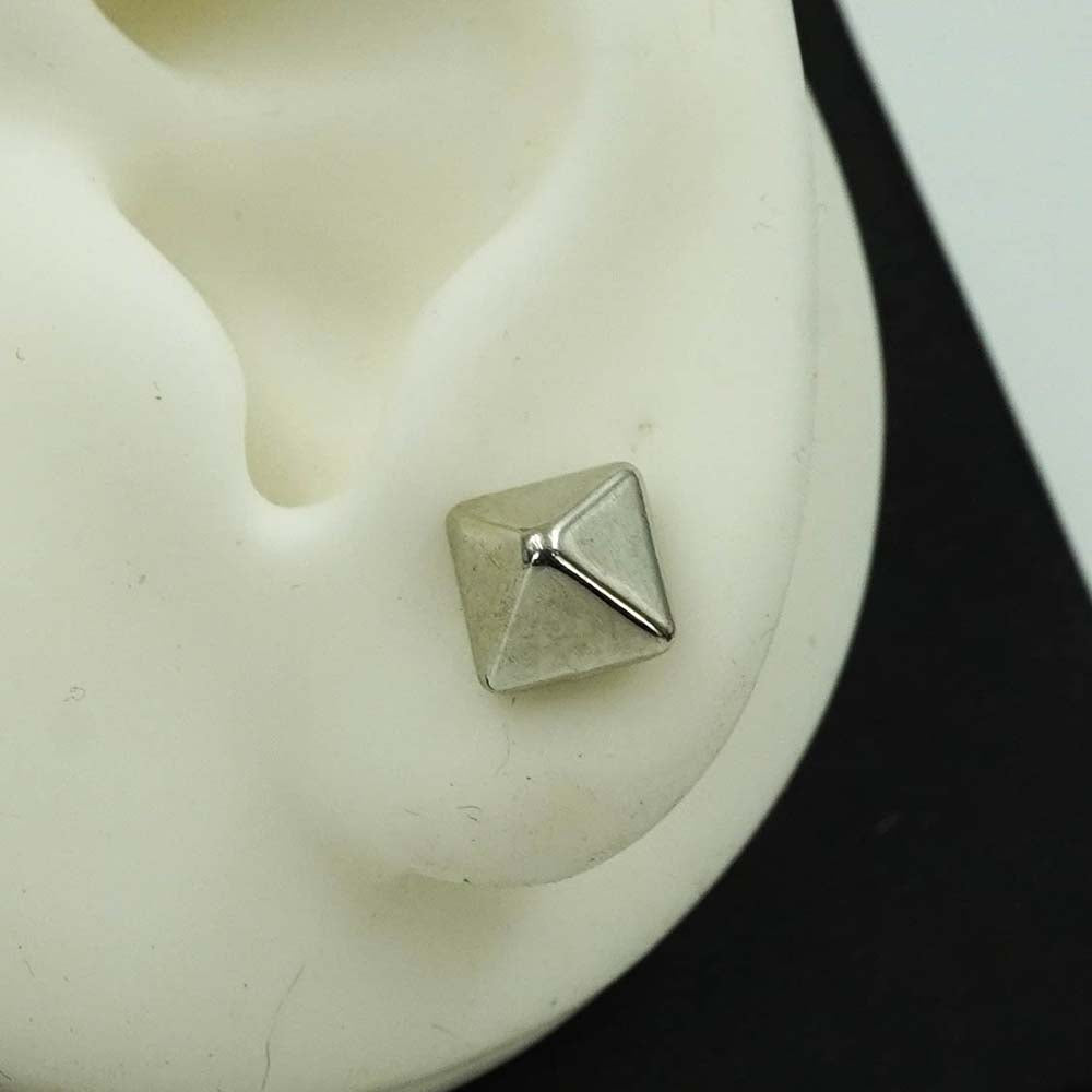 pyramid silver studs