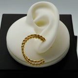 twisted golden hoops