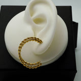 twisted golden hoops