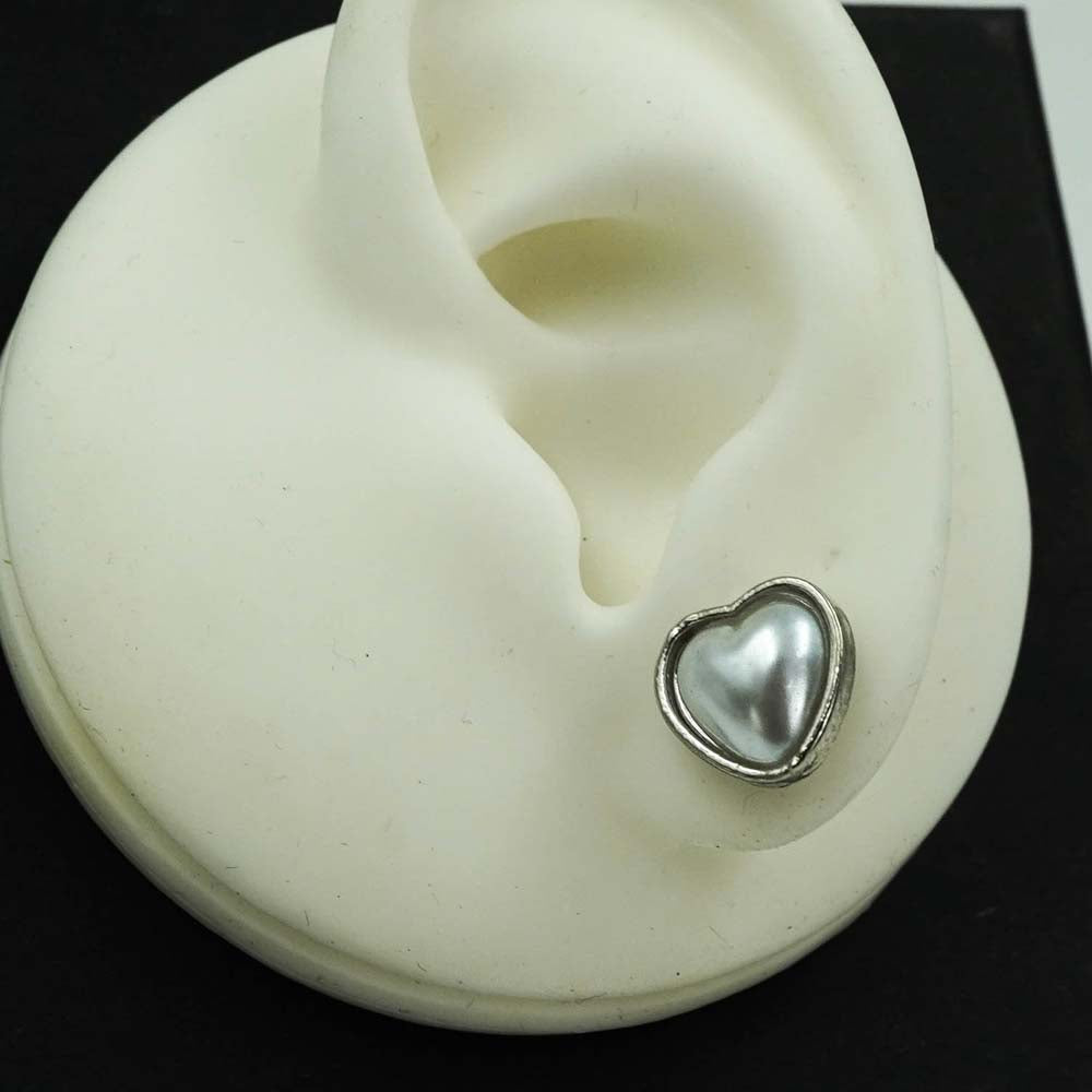 heart shaped silver studs