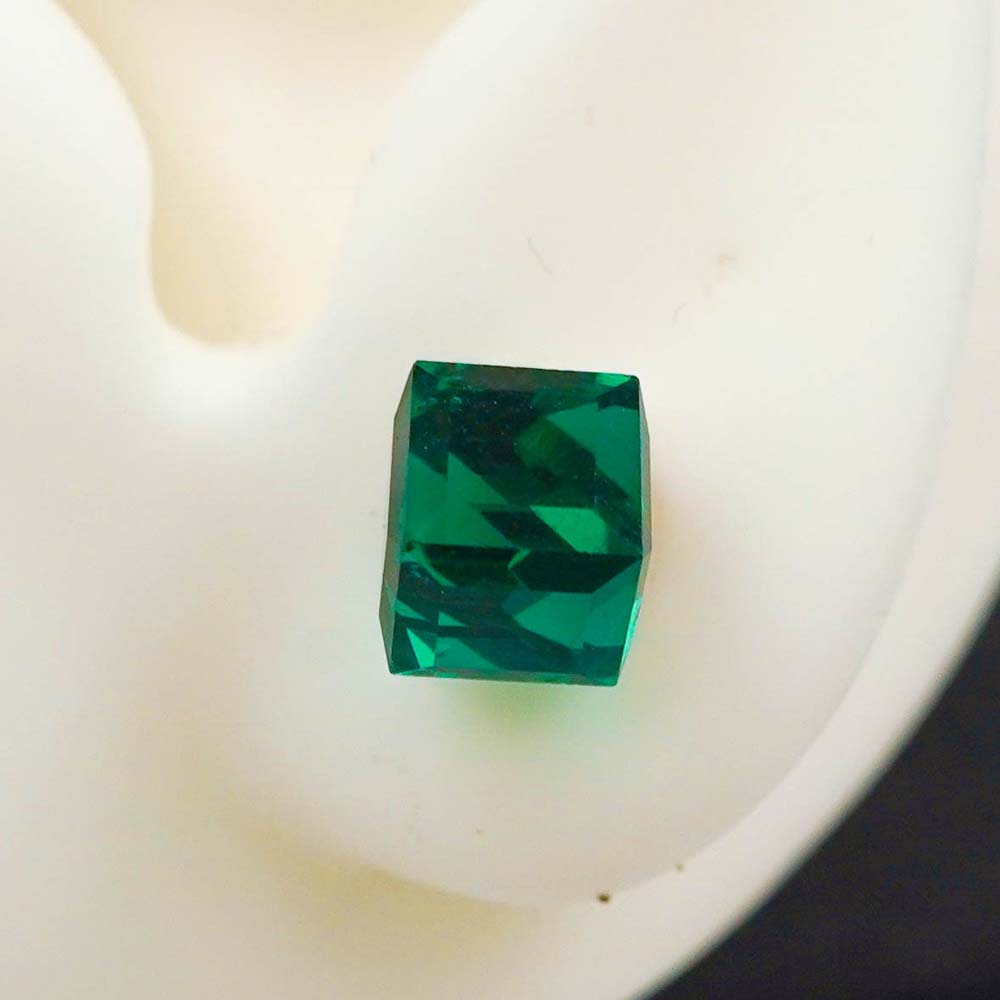 green cubic studs
