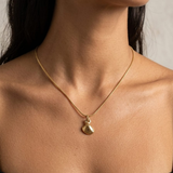 The Golden Shoreline Bivalve Pendant